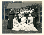 Wedding party with bride, attendants, and guests by The Francis Fronczak Collection