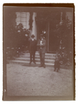 Two men standing on steps by The Francis Fronczak Collection
