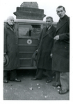 Three men standing in front of a vehicle by The Francis Fronczak Collection