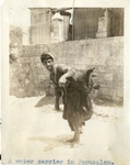 Jerusalem; 1926; Water Carrier; Photograph by Harry W. Rockwell