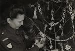 Volunteer Decorating a Christmas Tree, Polish Second Corps